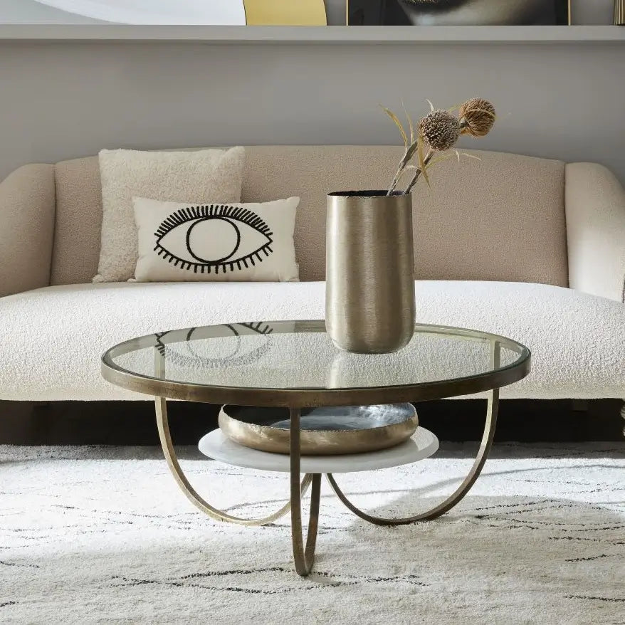 agatha-marble-bronze-round-coffee-table-in-neutral-living-room-with-bronze-accents-at-albury-house-interiors