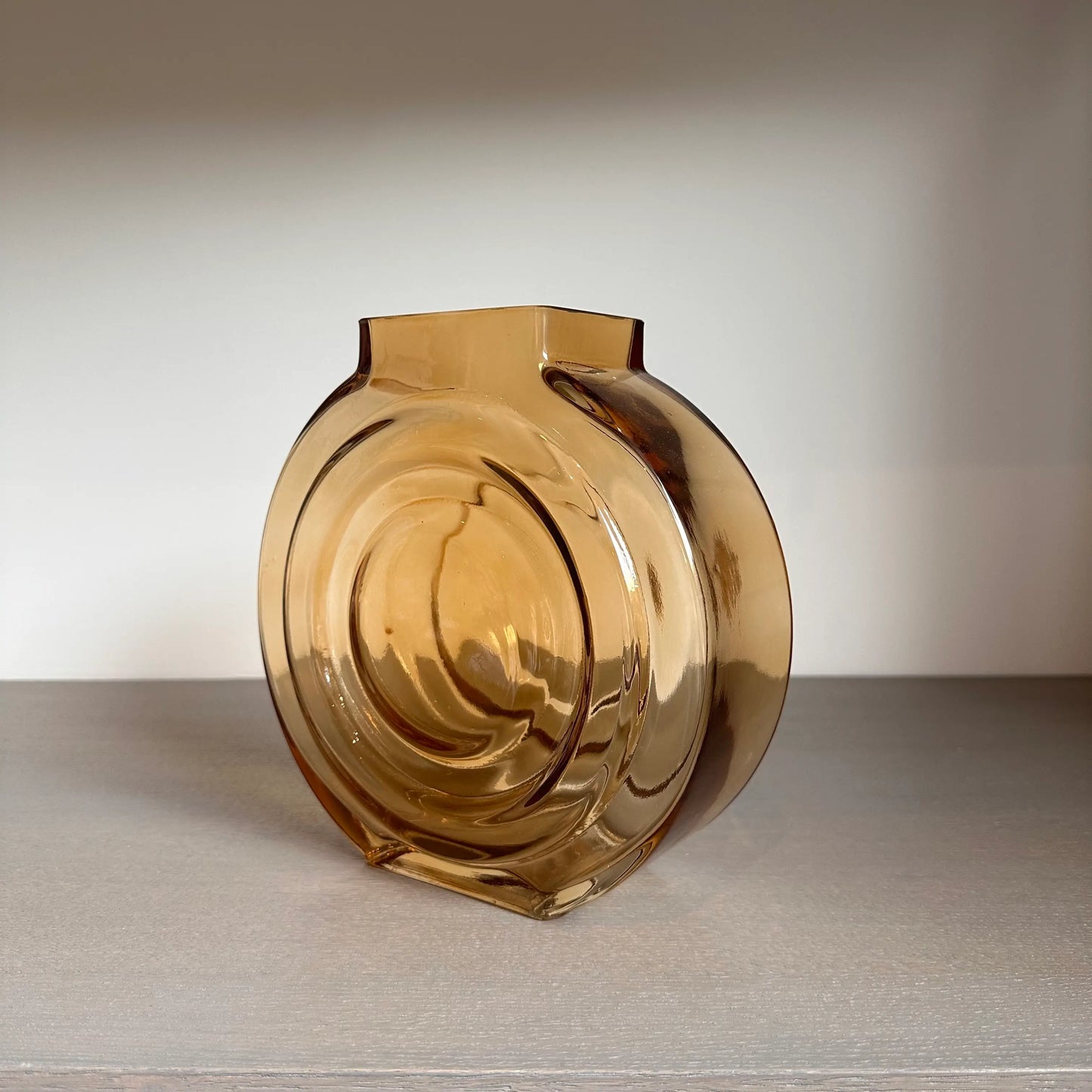 orange-amber-glass-round-vase-at-albury-house-interiors