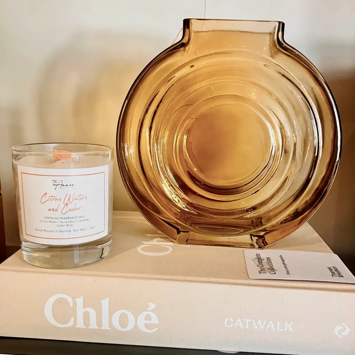 annex-accessories-citrus-waters-and-cedar-scented-soy-wax-natural-candle-with-wooden-wick-hand-poured-in-norfolk-with-chloe-designer-catwalk-coffee-table-book-available-at-albury-house-interiors