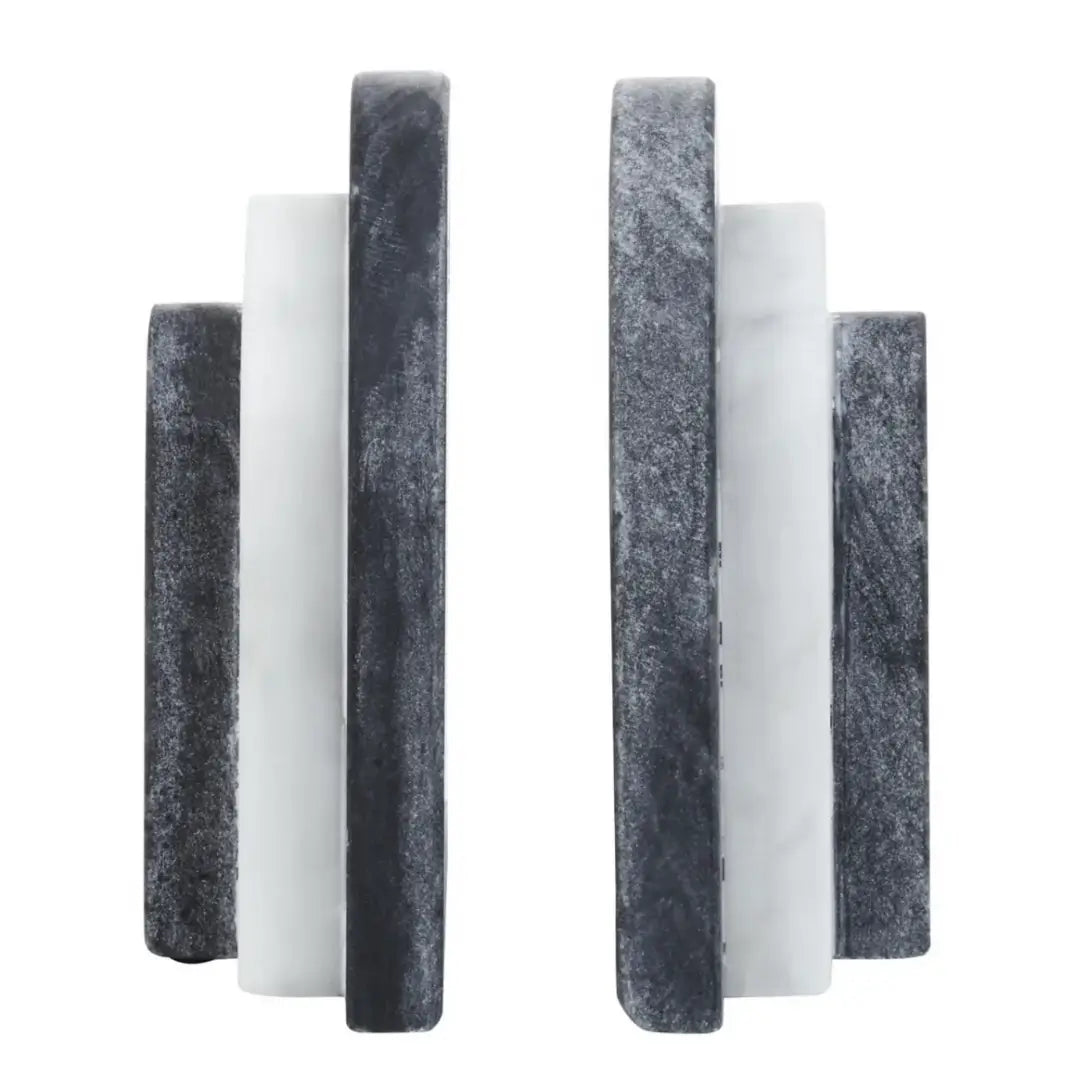 Black and white natural marble arched curved shape bookends at Albury House Interiors Essex.