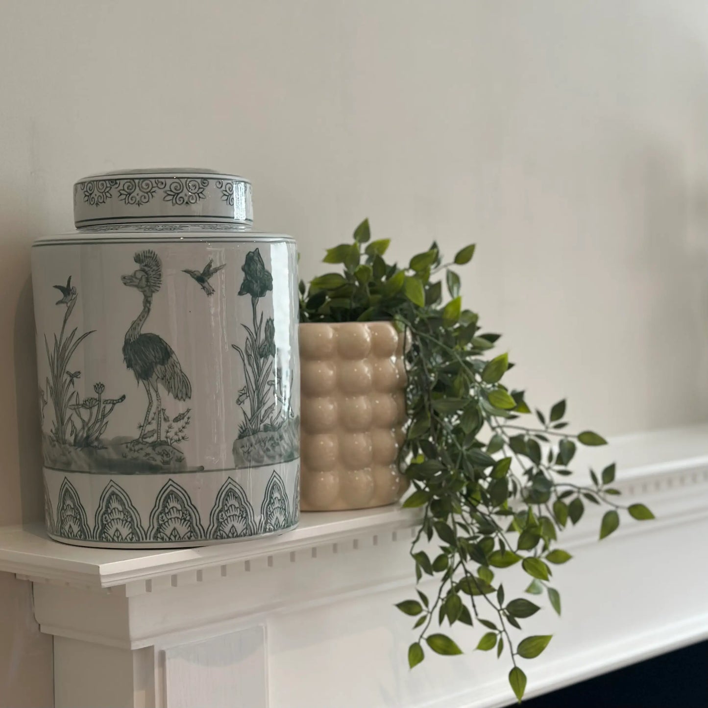 green-and-white-decorative-ceramic-temple-ginger-jar-with-bird-patterns-and-cream-ceramic-bubble-textured-planters-plant-pots-in-sizes-small-and-large-at-albury-house-interiors-matching-tye-essex
