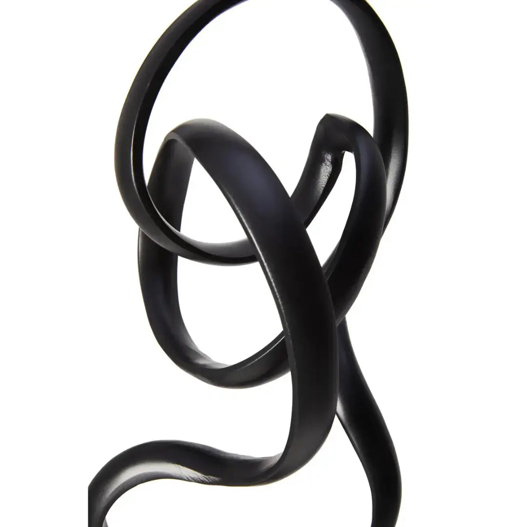 black-nickel-twist-knot-sculpture-on-marble-block-base-at-albury-house-interiors