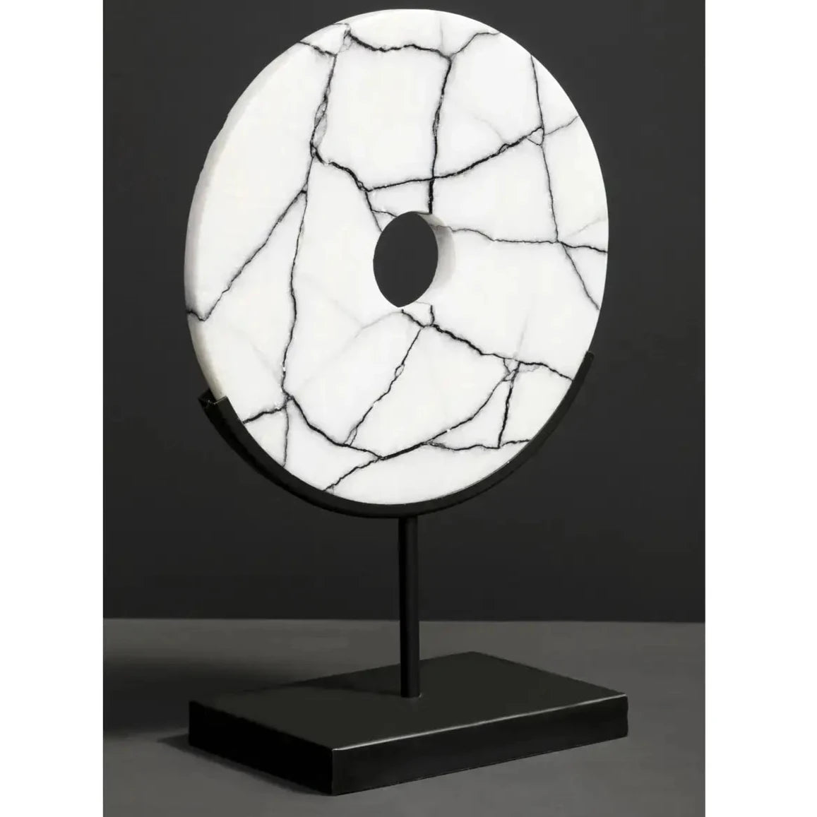 black-and-white-marble-disc-on-matt-black-stand-at-albury-house-interiors