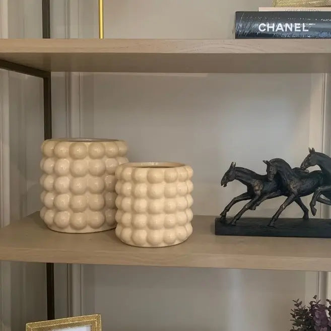 cream-ceramic-bubble-textured-planters-plant-pots-in-sizes-small-and-large-on-bespoke-shelving-unit-at-albury-house-interiors-matching-tye-essex