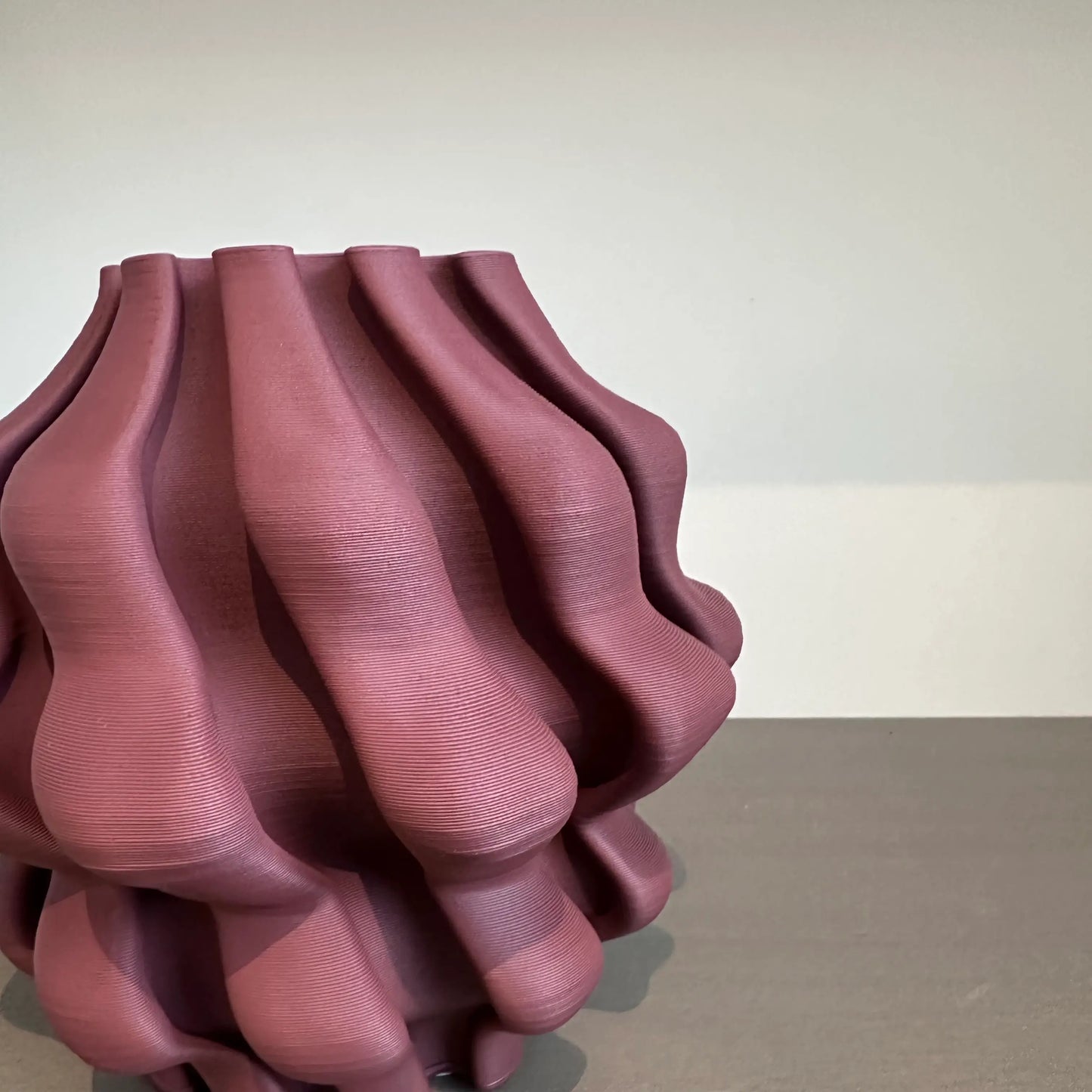 burgundy-ribbed-3d-printed-vase-with-wave-detail-at-albury-house-interiors-essex