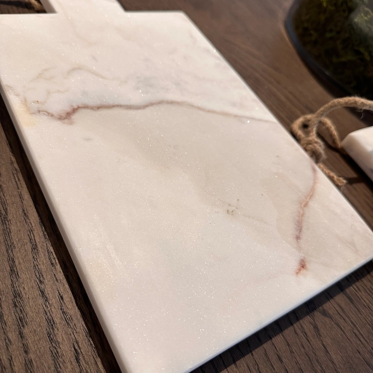 malmo-natural-white-veined-marble-chopping-serving-paddle-board-with-handle-and-hanging-string-at-albury-house-interiors