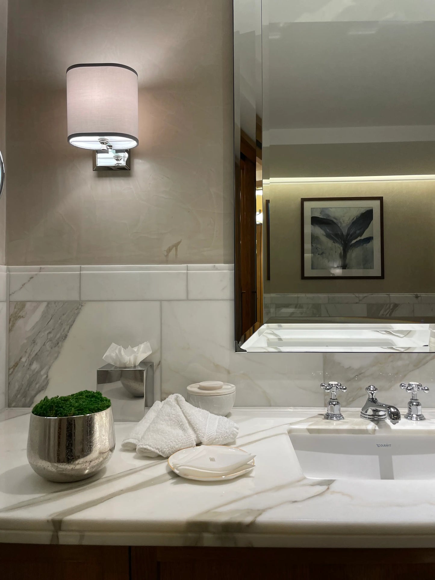 Chrome silver textured moss bowl, with preserved natural green moss, displayed in 30 suites across the iconic Corinthia Hotel London. Available to purchase from Albury House Interiors, homewares in the UK.