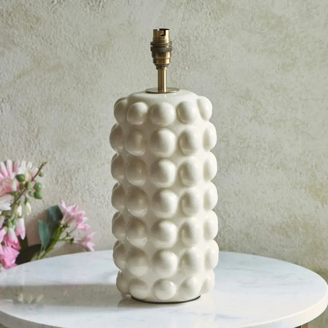 cream-off-white-crackle-ceramic-table-lamp-base-with-brass-lampholder-at-albury-house-interiors-on-a-table