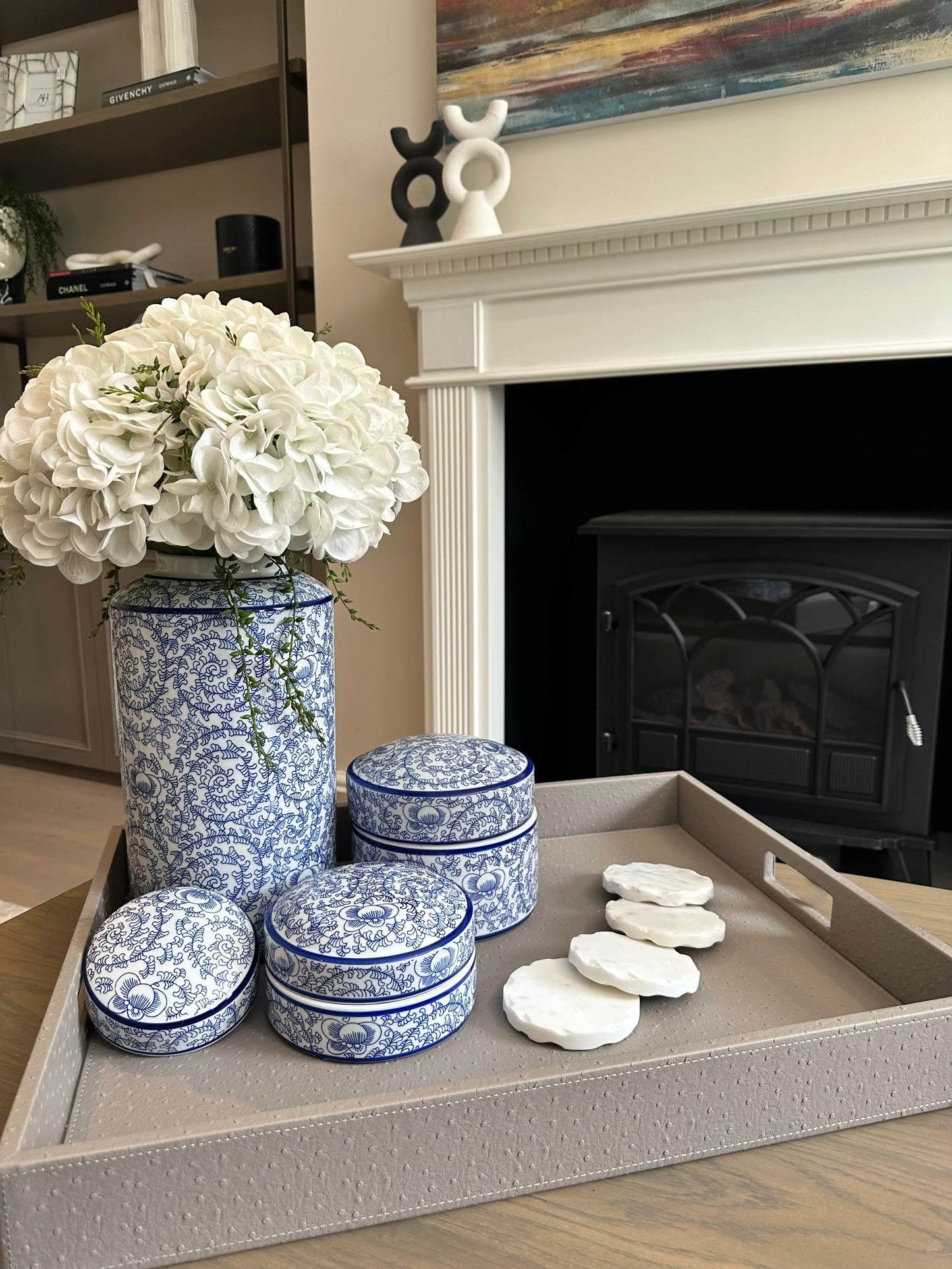 grey-mauve-faux-ostrich-leather-tray-with-handles-with-blue-and-white-patterned-ceramic-ginger-jars-and-trinkets-at-albury-house-interiors
