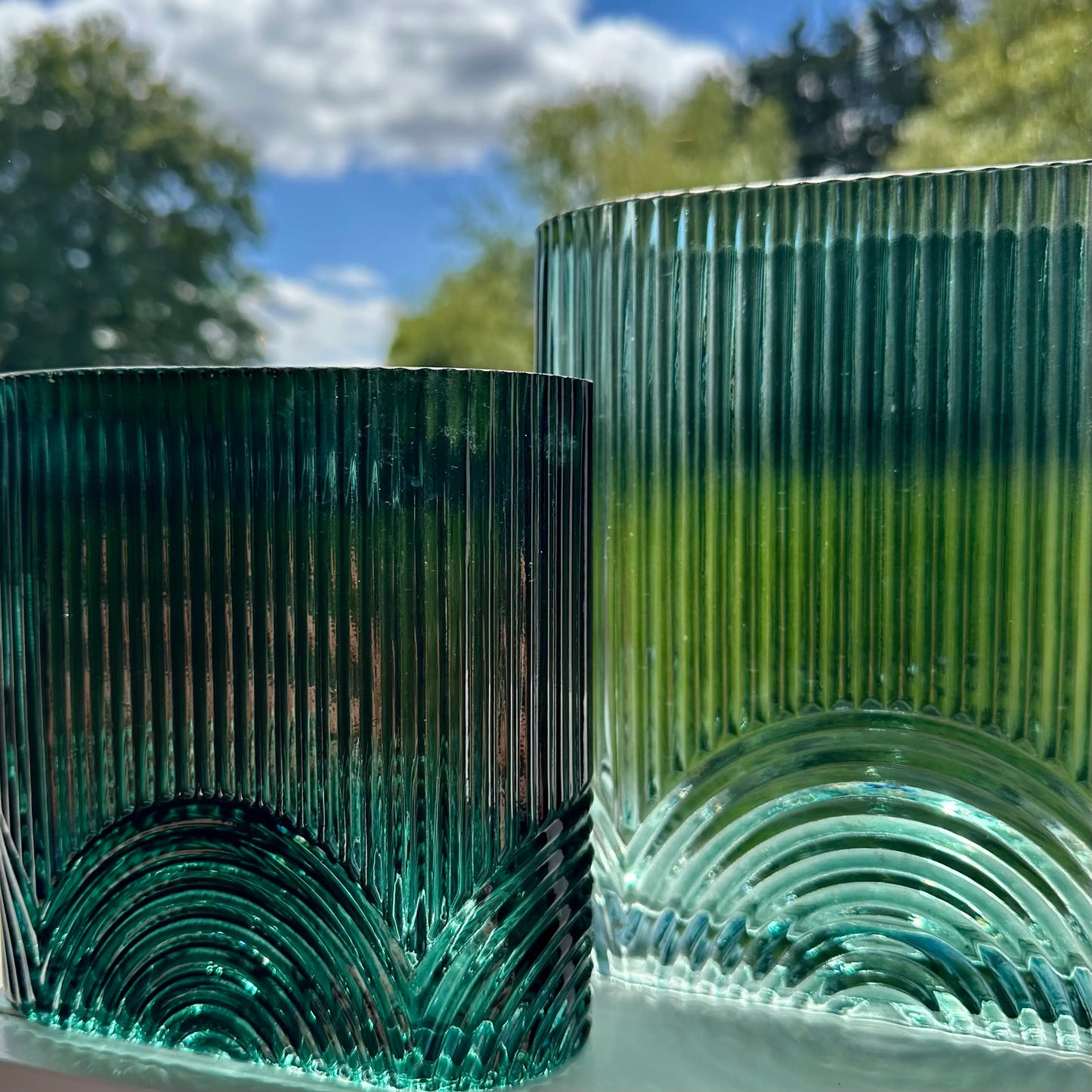 green-glass-ribbed-vases-with-arched-detail-in-small-and-large-at-albury-house-interiors