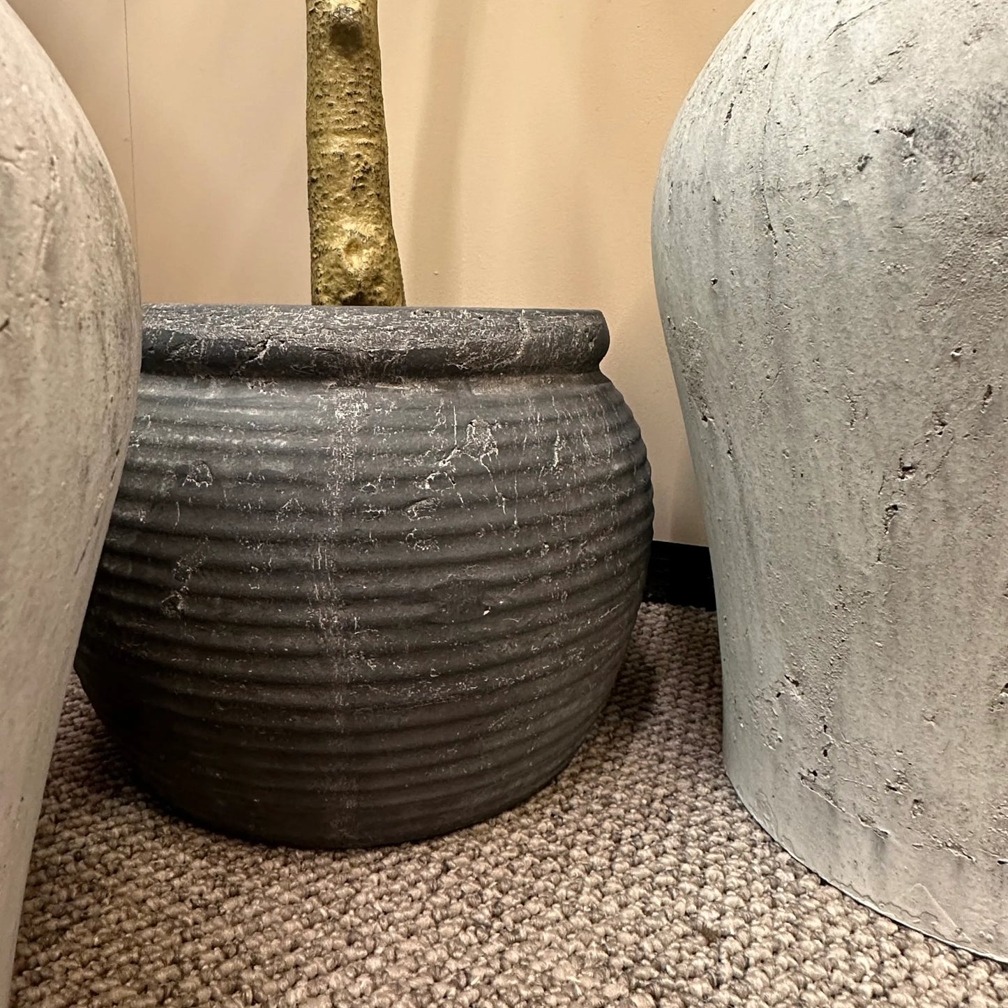 dark-grey-distressed-concrete-ribbed-plant-pot-at-albury-house-interiors-essex