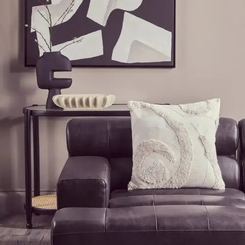 Harlem cream oval shaped bowl, crafted from aluminium, displayed in a monochrome living room. Perfect for dining rooms, living rooms and kitchens. Available to purchase from Albury House Interiors.