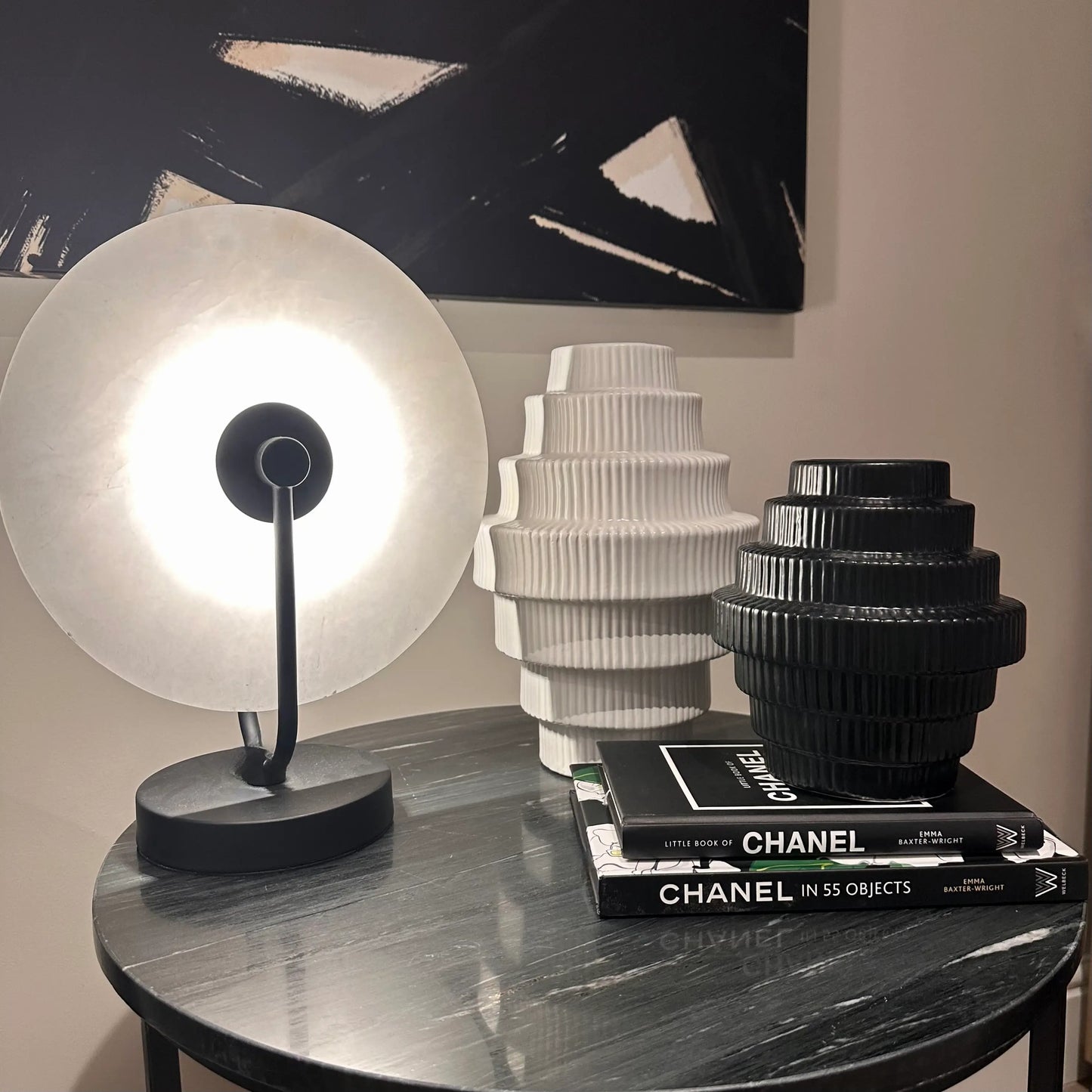 cermic-stepped-ribbed-vases-in-black-and-white-on-marble-table-at-albury-house-interiors