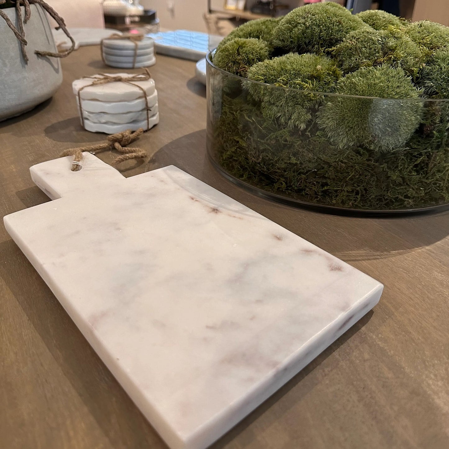 malmo-natural-white-veined-marble-chopping-serving-paddle-board-with-handle-and-hanging-string-at-albury-house-interiors