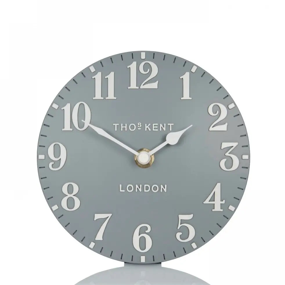 grey-circular-thomas-kent-pale-blue-battery-powered-mantel-clock-with-white-hands-and-numbers-at-albury-house-interiors-essex