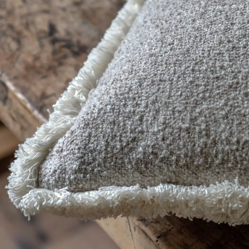 neutral-boucle-cream-edge-fringed-square-cushion-andrew-martin-style-at-albury-house-interiors-essex