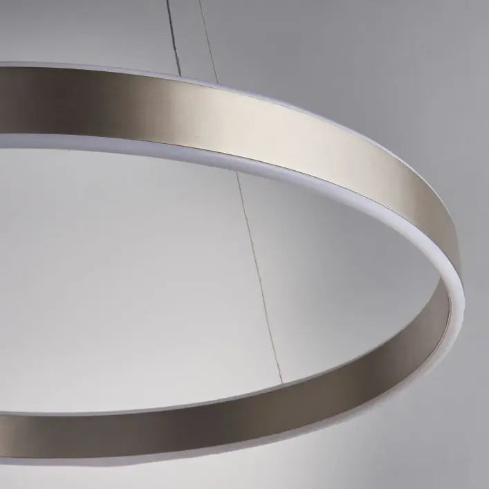 Nickel round halo ceiling light, suspended from thin wires giving a beautiful glow in living rooms, kitchens, bedrooms, dressing rooms. Available at Albury House Interiors, Matching Tye, Essex.