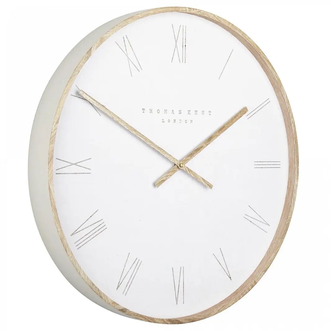 Norway round wall clock with white face and matching outer rim, and wooden effect hands and front edge. Available to purchase at Albury House Interiors, homewares shop in Essex.