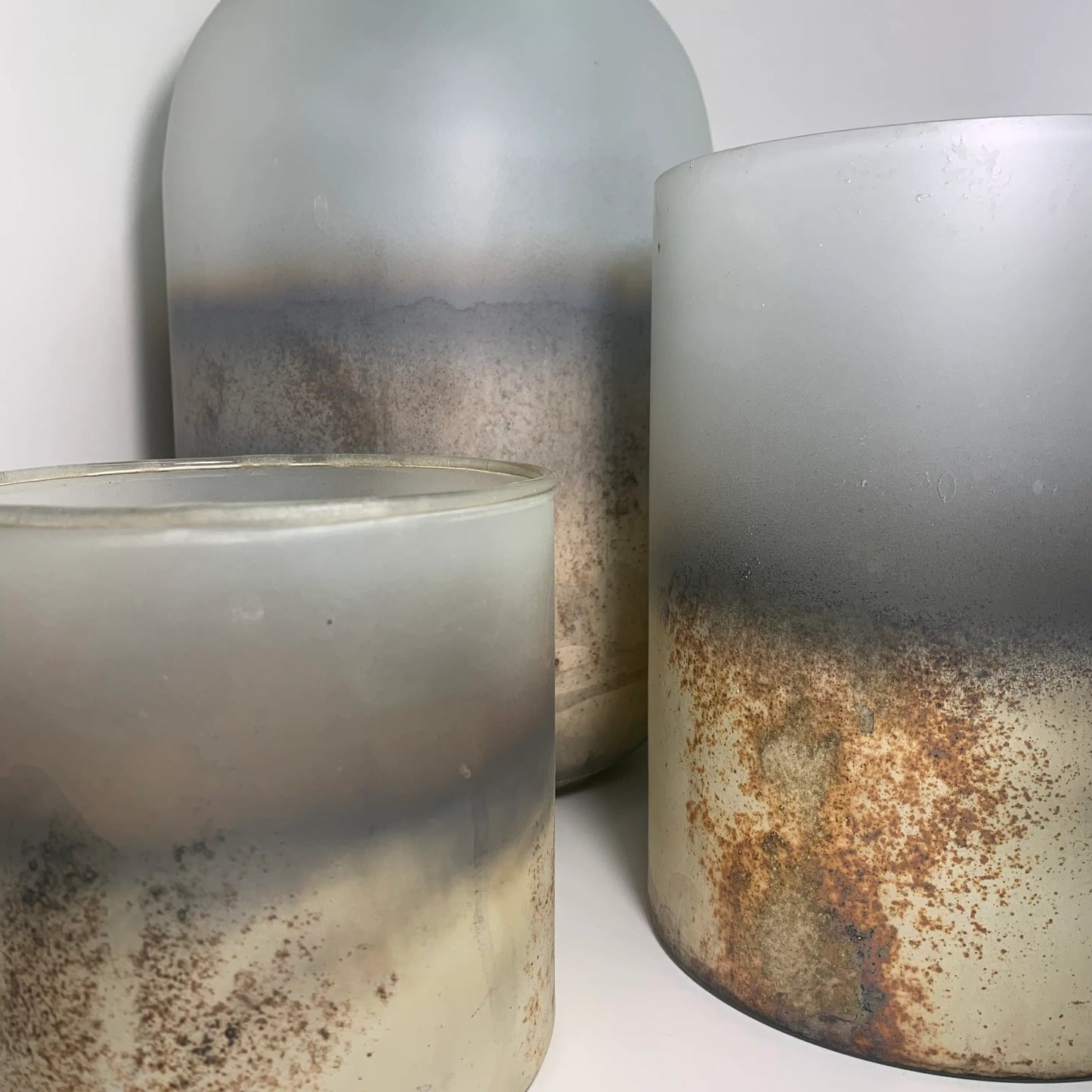 pluto-grey-beige-oxidised-candle-holder-at-albury-house-interiors