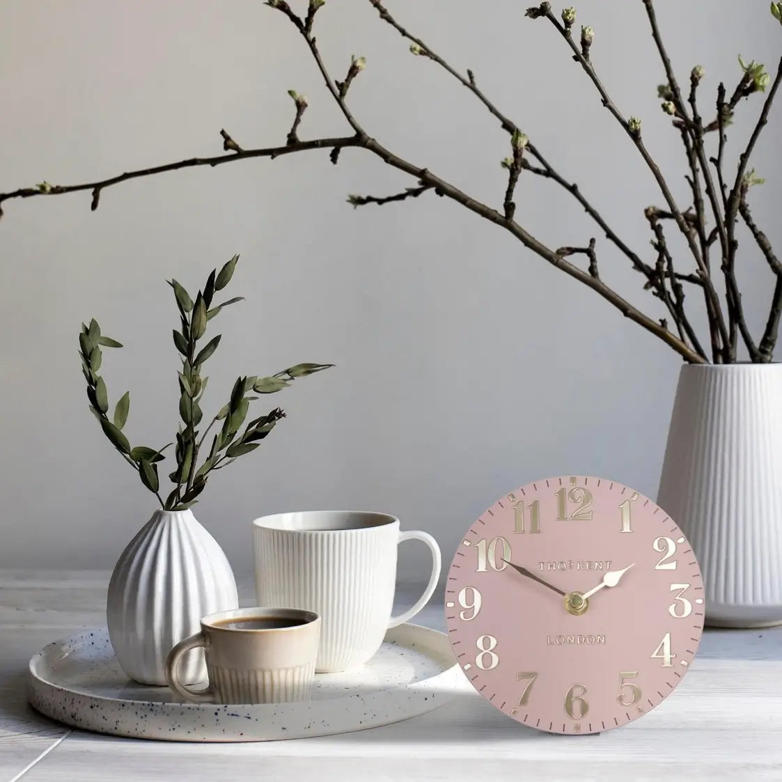 round-small-mantel-clock-with-gold-numbers-and-hands-at-albury-house-interiors