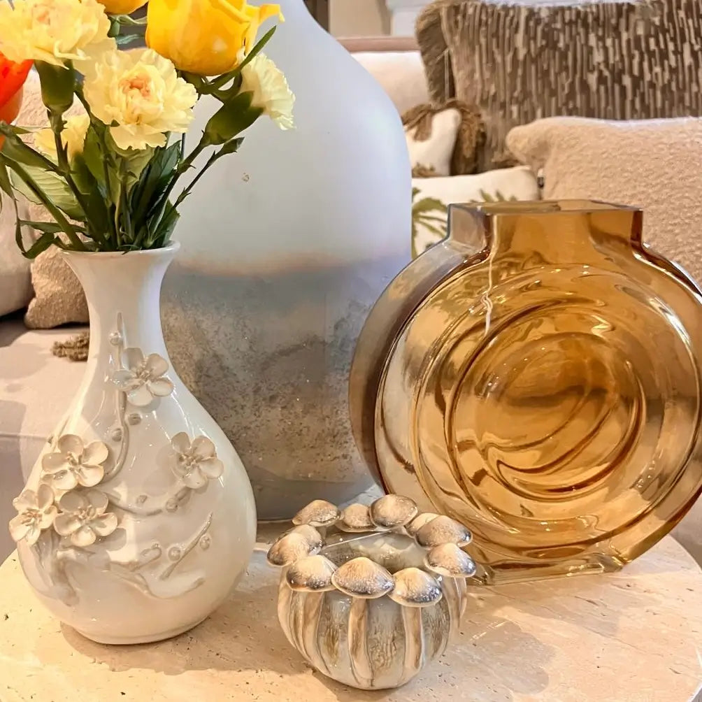 small-neutral-ceramic-3d-blossom-flower-vase-with-mushroom-tealihht-holder-and-amber-glass-retro-vase-at-albury-house-interiors-essex
