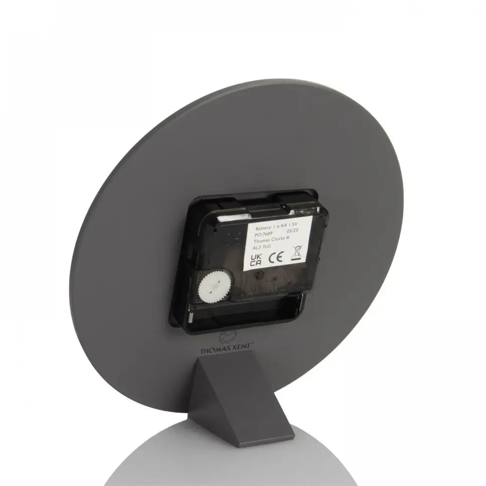 small-round-thomas-kent-mantel-clock-with-dark-grey-face-and-white-numbers-and-hands-at-albury-house-interiors