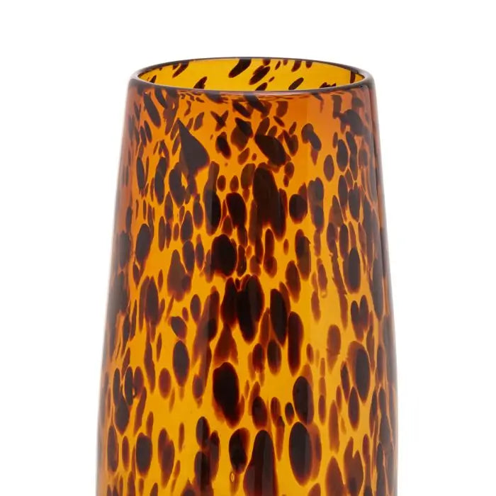 Tortoise shell slim amber glass vase with brown flecks and patterns throughout, available to purchase at Albury House Interiors.
