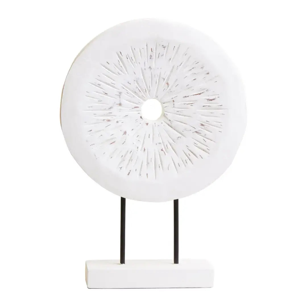 whitewash-wooden-carved-disc-sculpture-on-black-stand-at-albury-house-interiors