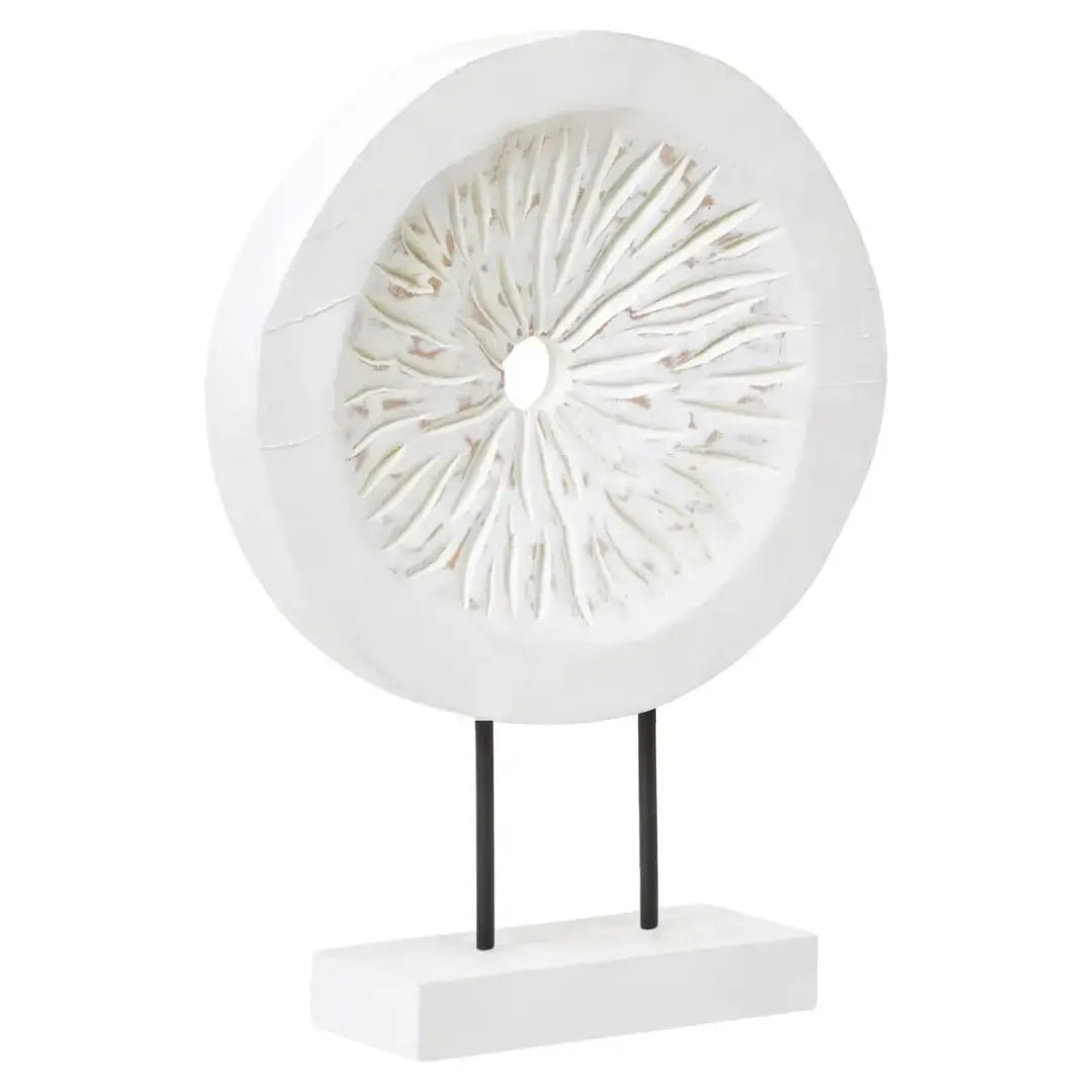 whitewash-wooden-carved-disc-sculpture-on-black-stand-at-albury-house-interiors