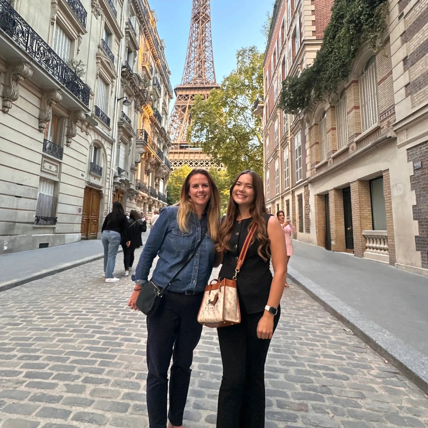 Albury House Interiors Courtney and Kathryn in front of the Eiffel Tower in Paris, France. Visiting the Maison and Objet trade interiors show, for homewares, decor and seeing the latest interior trends.