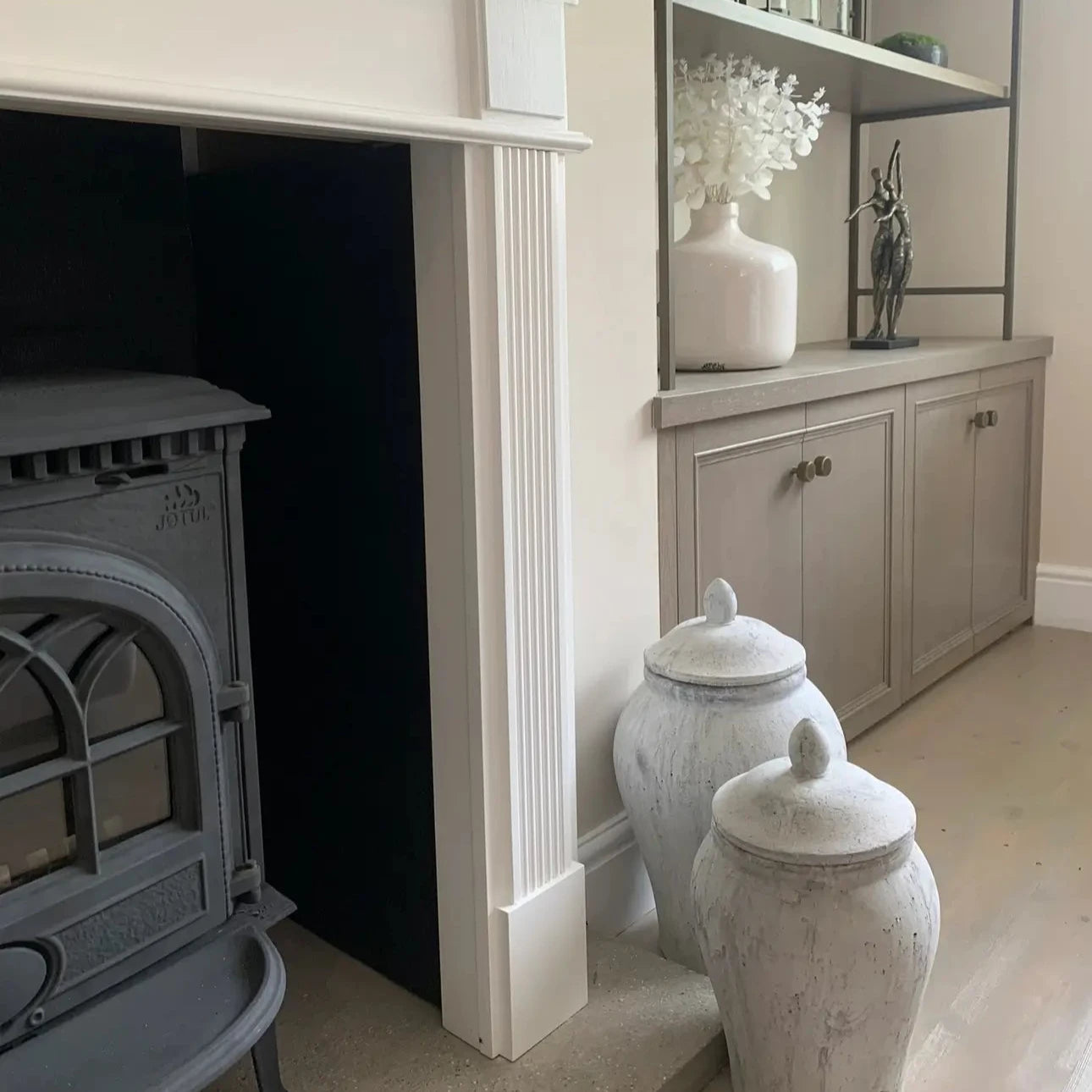 albury-house-interiors-media-wall-with-stone-ginger-jars-anddecoartive-items