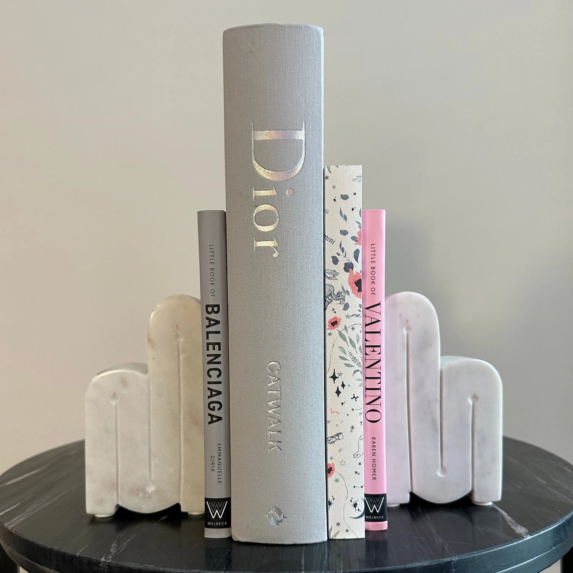 albury-house-interiors-white-curved-marble-bookend-set-with-grey-and-pink-coffee-table-books