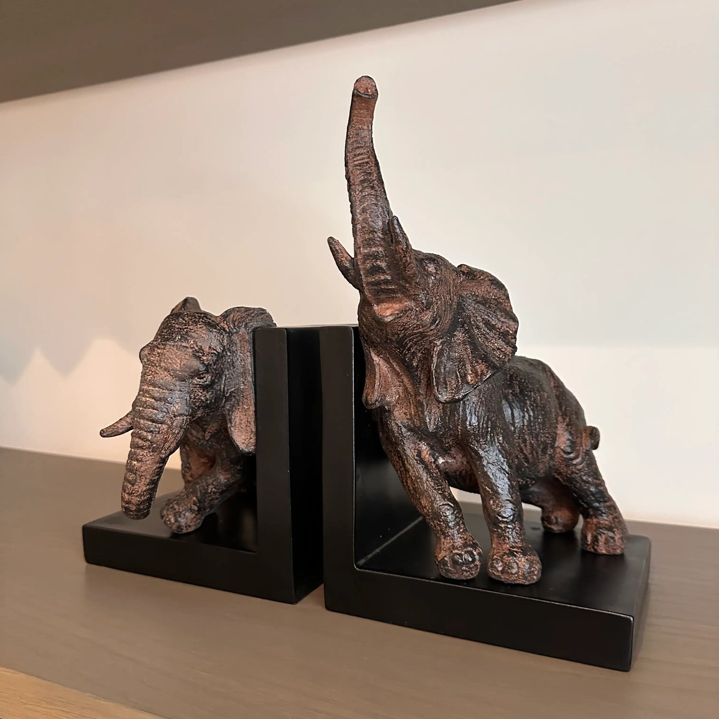 antique-bronze-and-black-pair-of-elephant-bookends-at-albury-house-interiors 