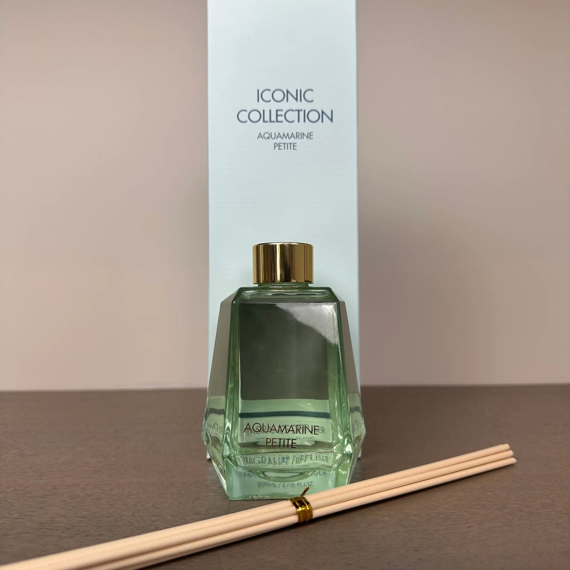 aquamarine-pale-blue-glass-reed-diffuser-with-rose-amber-clove-pomegranate-scents-with-blue-gift-box-from-albury-house-interiors-essex