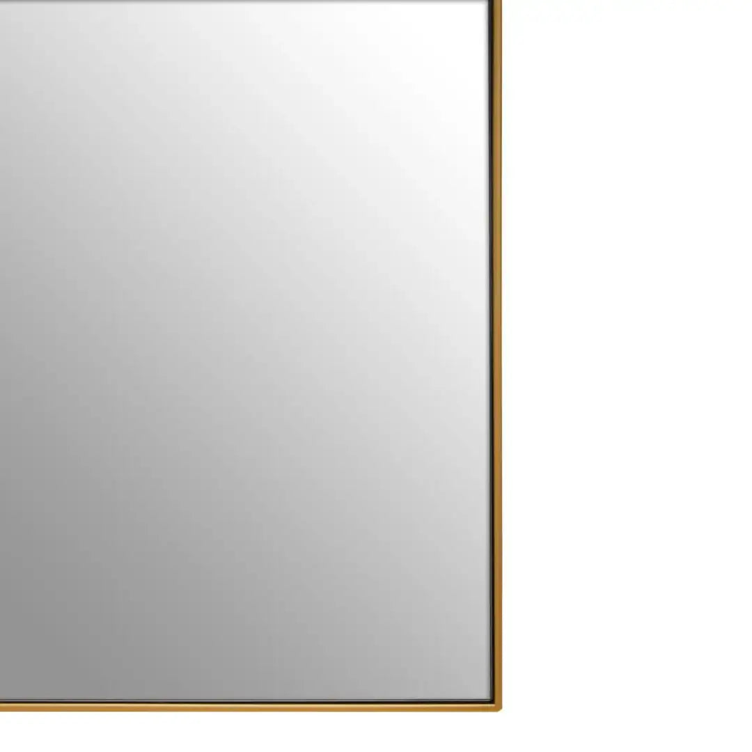 arched-gold-slim-framed-wall-mirror-at-albury-house-interiors