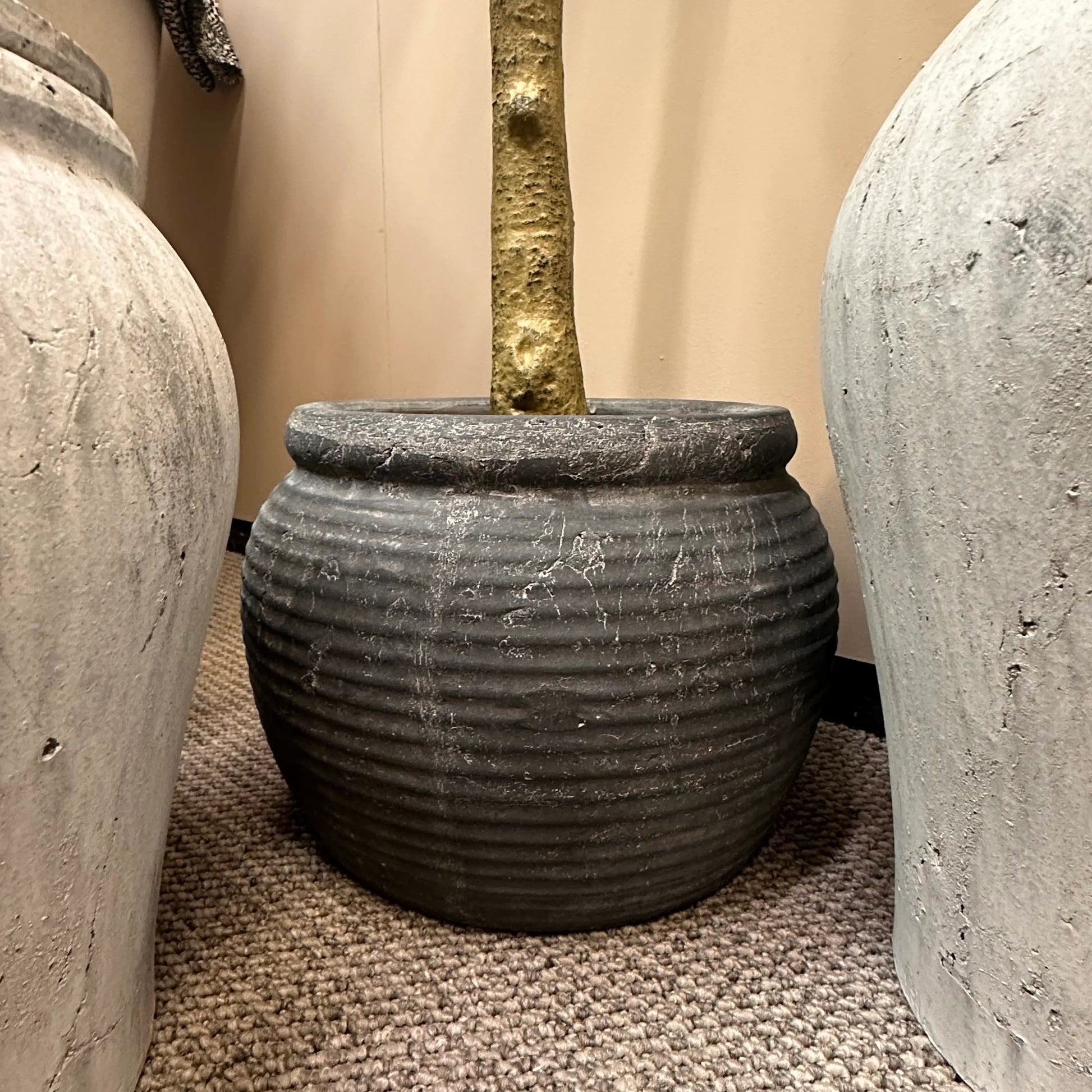 dark-grey-distressed-concrete-ribbed-plant-pot-at-albury-house-interiors-essex