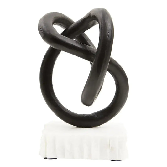 black-knot-sculpture-on-raw-edge-natural-white-marble-base-at-albury-house-interiors-harlow-essex