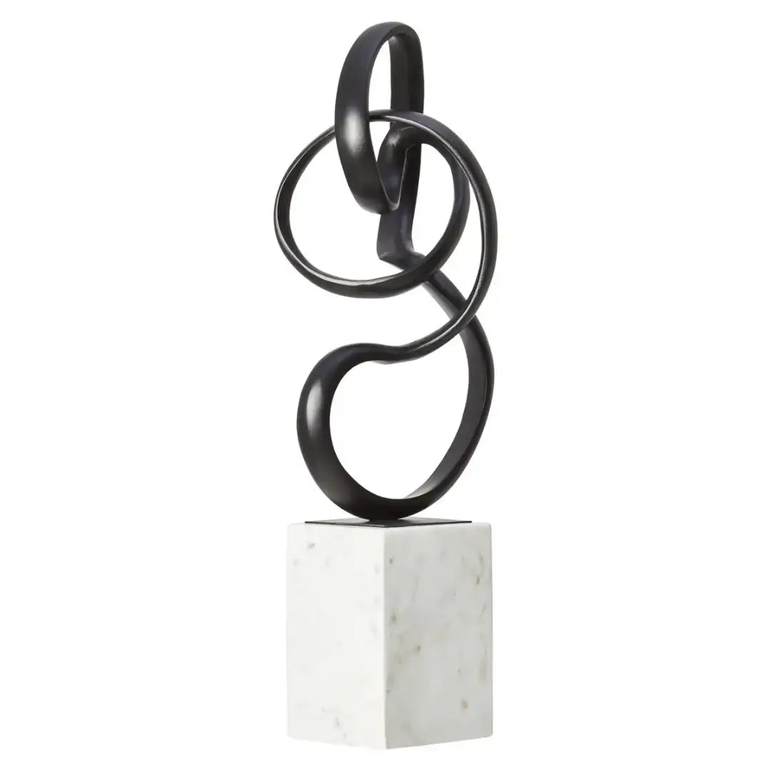black-nickel-twist-knot-sculpture-on-marble-block-base-at-albury-house-interiors