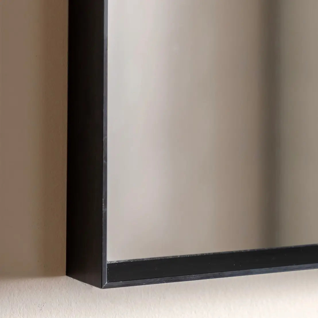 black-overmantle-semi-circle-wall-mirror-matte-black-frame-at-albury-house-interiors