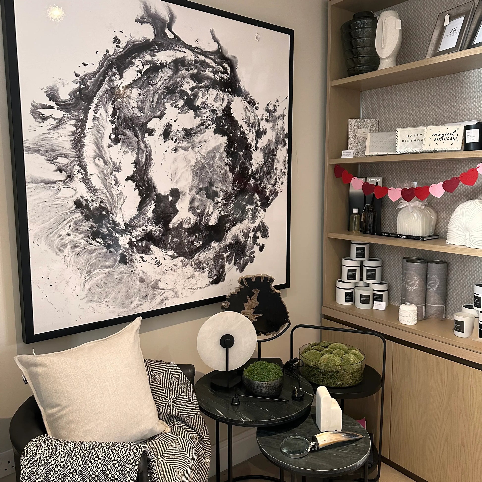 black-and-white-gloss-galaxy-swirls-artwork-in-black-pine-frame-with-monochrome-decor-at-albury-house-interiors