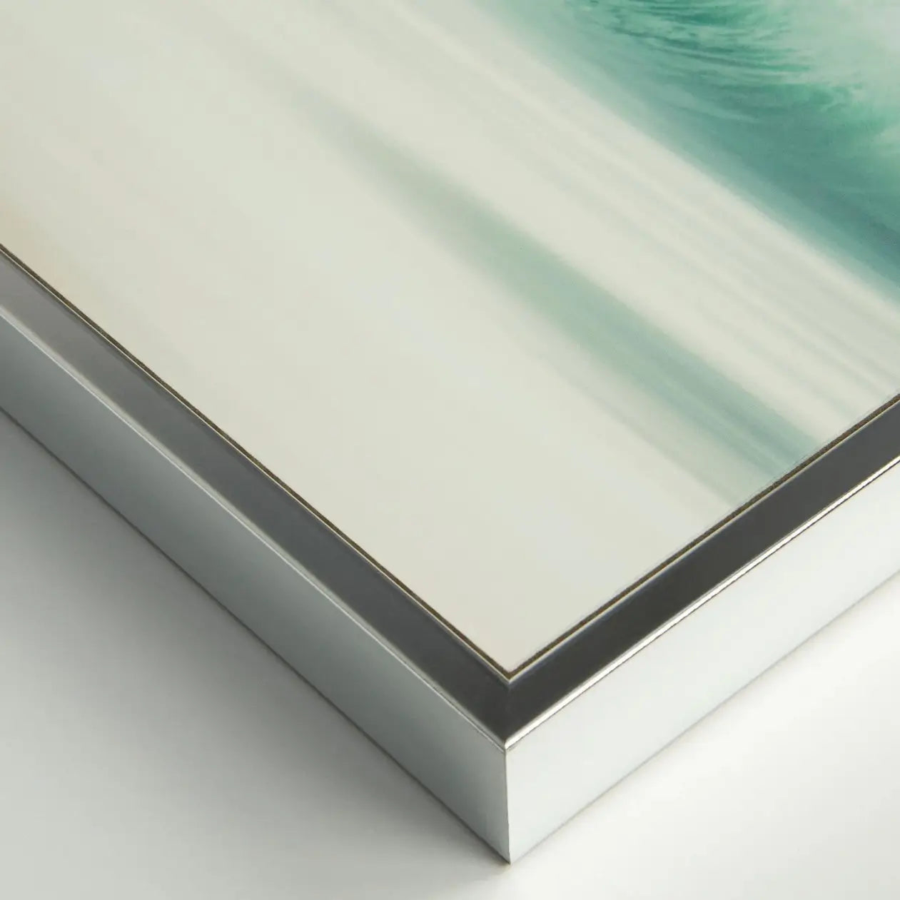 abstract-blue-motion-artwork-beach-scene-with-blue-sky-and-water-in-chrome-effect-frame-at-albury-house-interiors