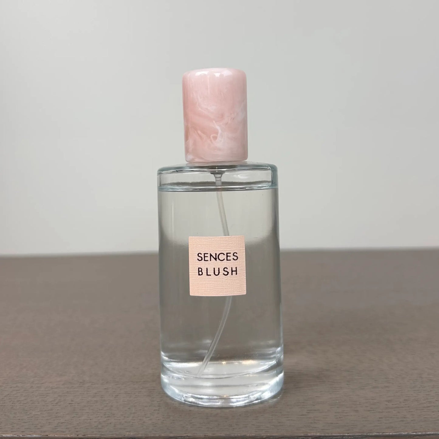 sences-blush-rose-scented-room-spray-in-glass-bottle-with-pink-marbled-resin-lid-presented-in-gift-box-at-albury-house-interiors