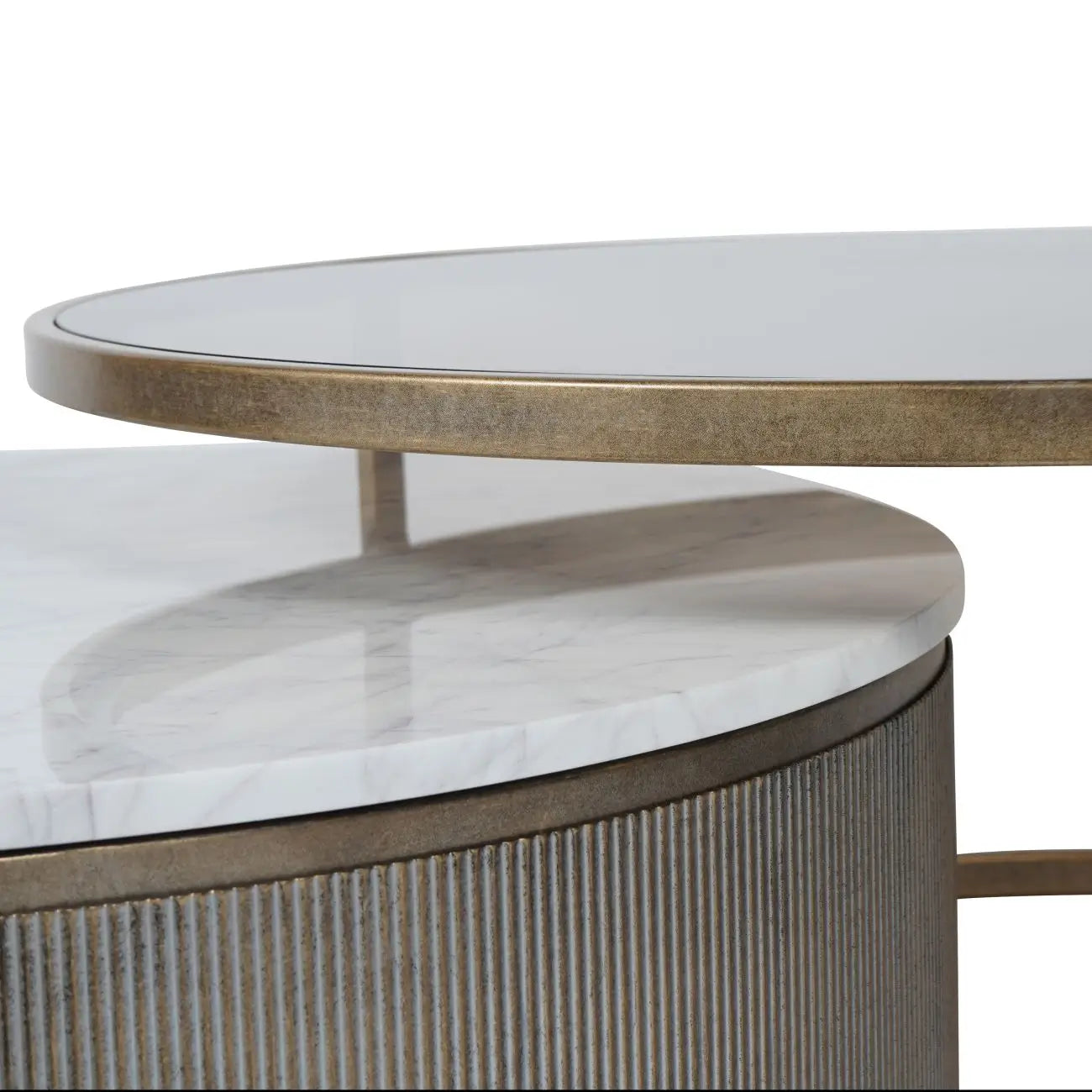 Set of two nesting coffee tables crafted from brushed bronze with smoked glass and white natural marble tops. Available to purchase from Albury House Interiors, Matching Tye Essex. 