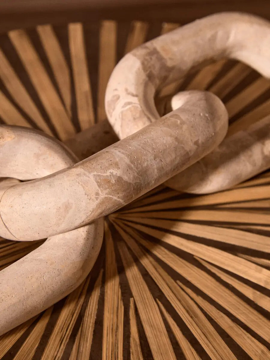 Chocolate brown natural marble chain sculpture with three interlocked links, beautiful displayed on a coffee table, a tray or a stack of coffee table books. Available to purchase at Albury House Interiors. 