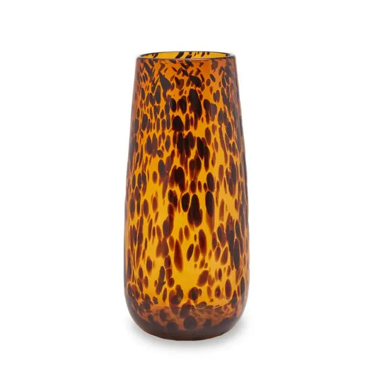 Tortoise shell slim amber glass vase with brown flecks and patterns throughout, in sizes small and large. Available to purchase at Albury House Interiors. 