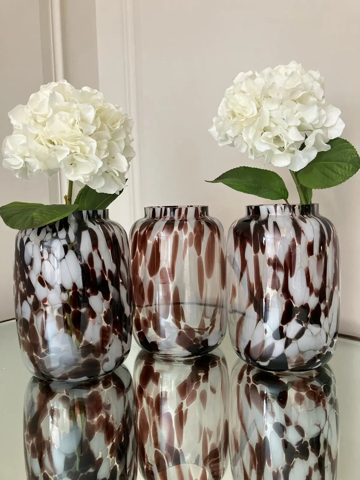 Brown and white speckled mottled blown glass vase, each vase is individual as no two are the same. Available to purchase at Albury House Interiors, Essex. 