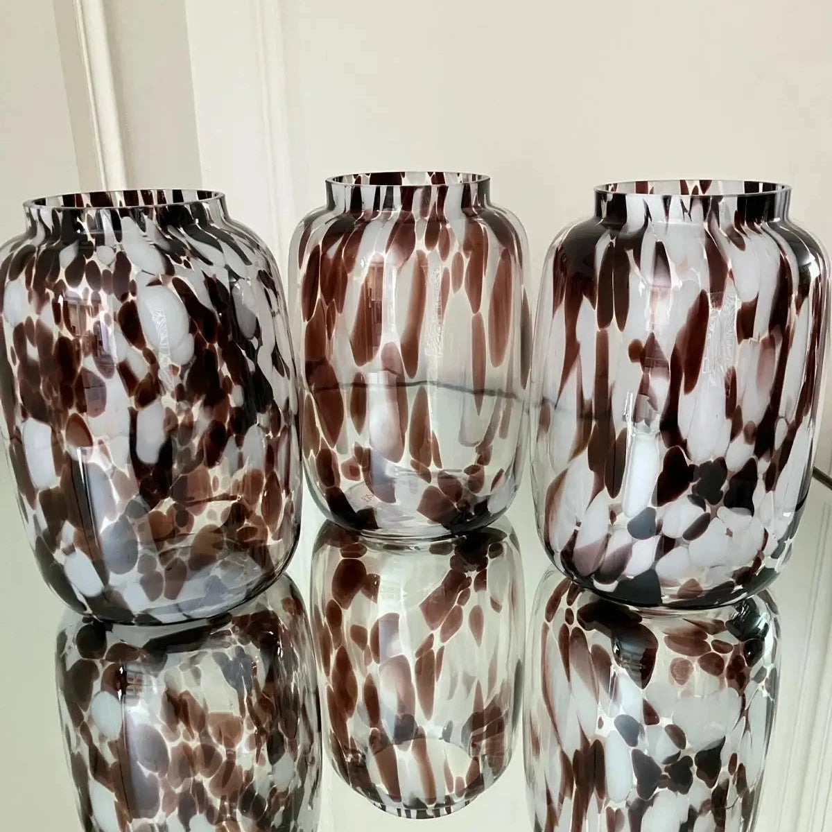 Brown and white speckled mottled blown glass vase, each vase is individual as no two are the same. Available to purchase at Albury House Interiors, Essex. 