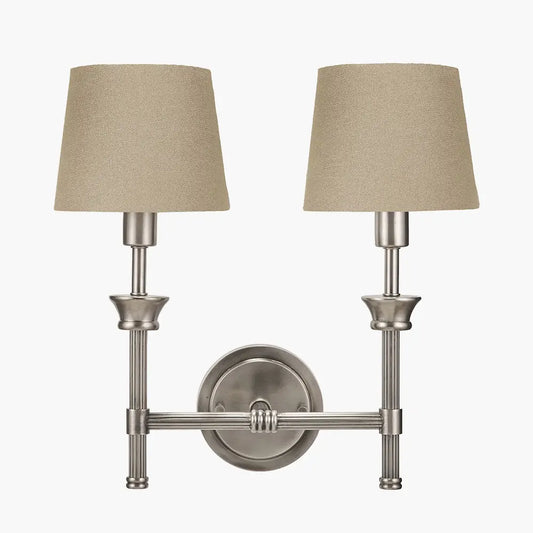 brushed-silver-cast-brass-double-wall-light-with-stepped-backplate-ribbed-detail-and-taupe-cotton-shades-at-albury-house-interiors