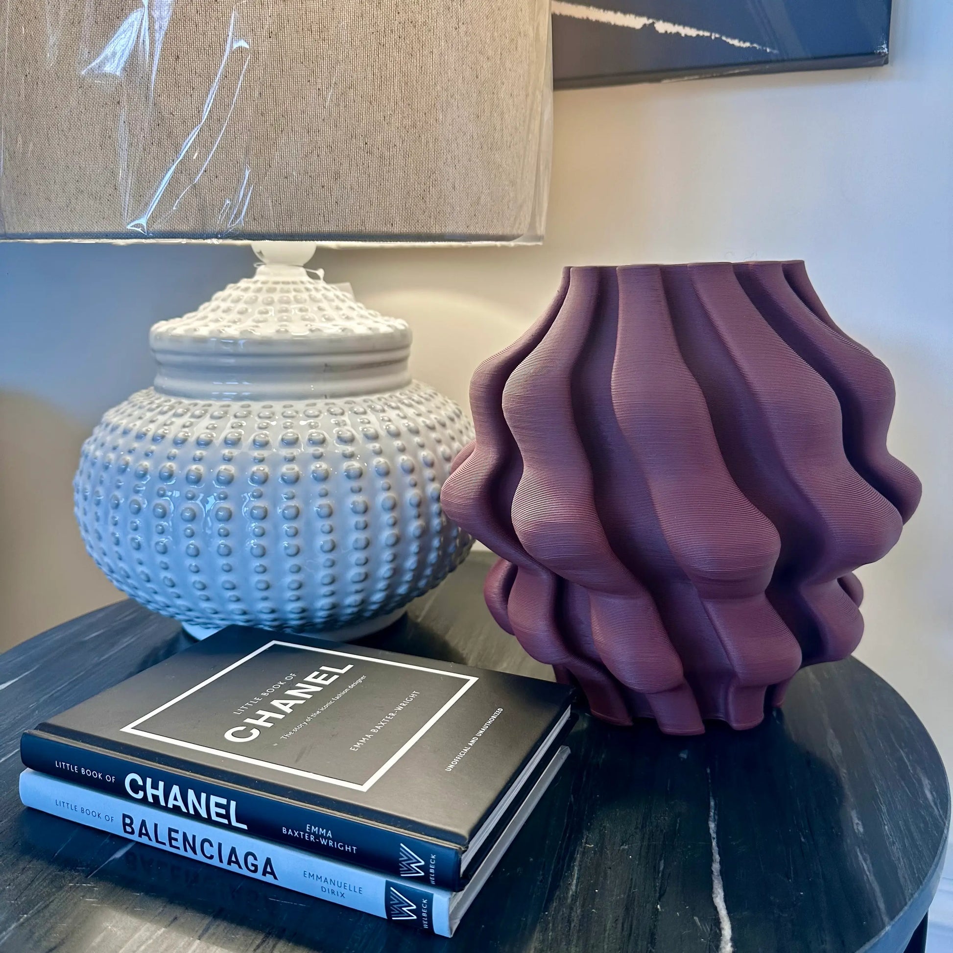 burgundy-ribbed-3d-printed-vase-with-wave-detail-and-cream-dimple-ceramic-table-lamp-at-albury-house-interiors-essex