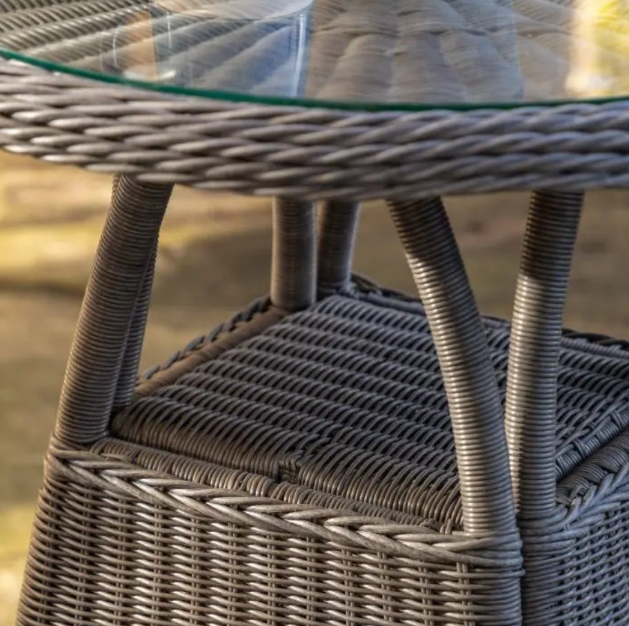 A 3-piece outdoor patio bistro set featuring two grey woven wicker armchairs and a matching round wicker side table on a solid white background.